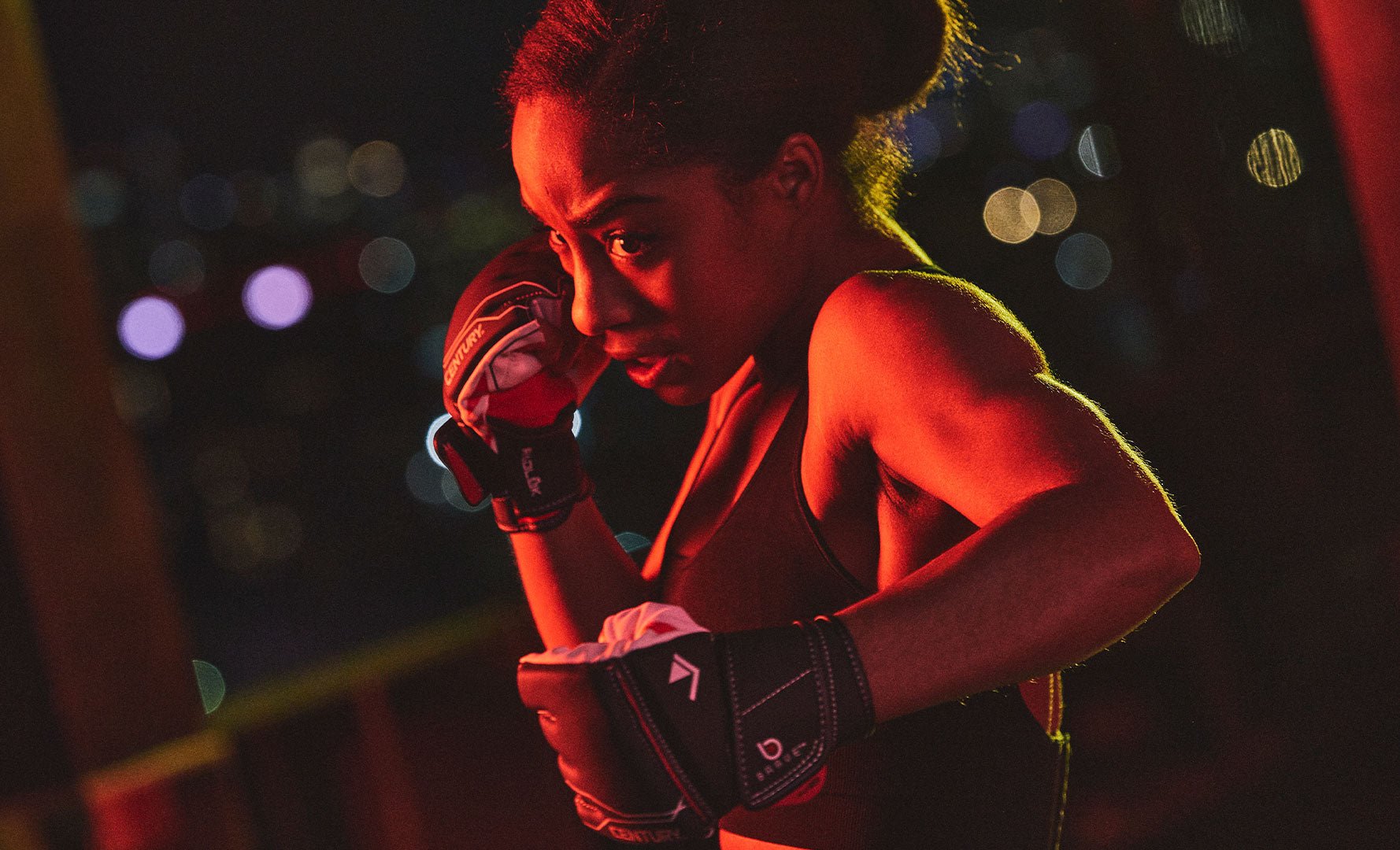 Female martial artist wearing gloves